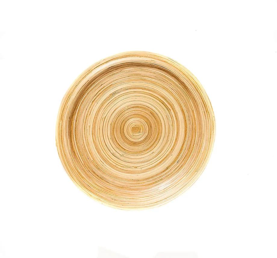 Top view of a bamboo napkin ring with a textured fabric napkin tied in a bow.