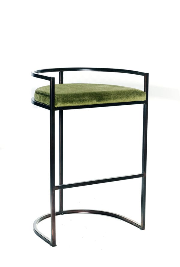 Lucena barstool with green velvet seat and curved open back in black metal frame.