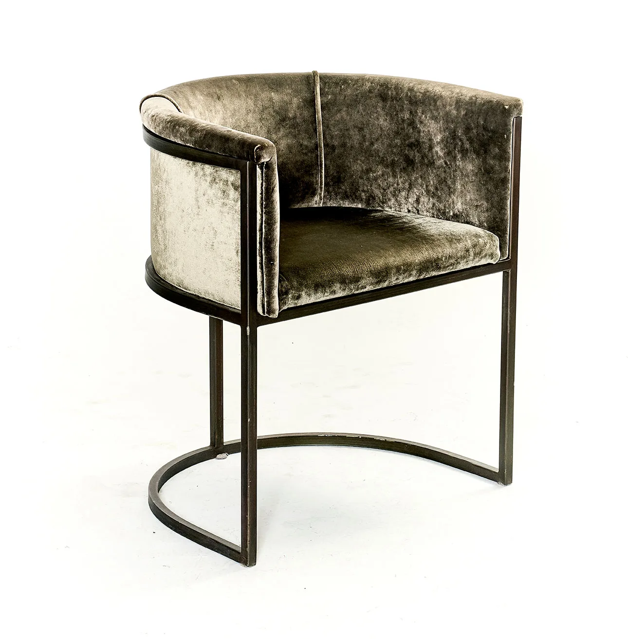 Lucena dining chair in soft taupe velvet with tubular metal frame.