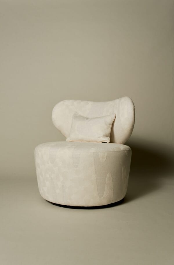 Margaux club chair in ivory patterned upholstery with matching cushion.