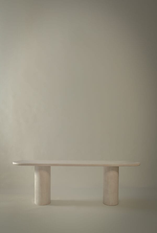 Seine console with rounded corners and two cylindrical legs.