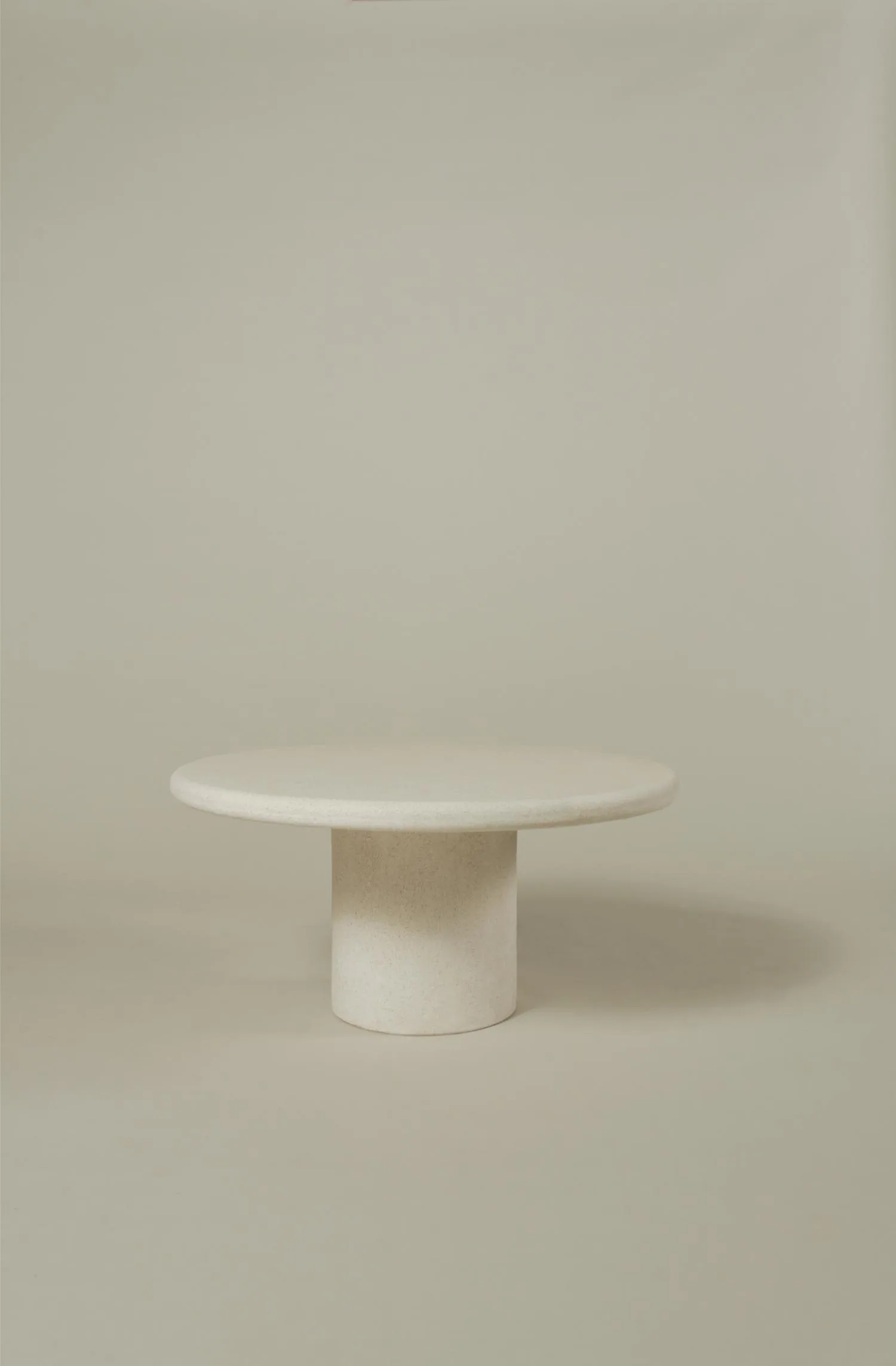 Medium-sized Mushroom Durastone coffee table in a sculptural, monochromatic finish.