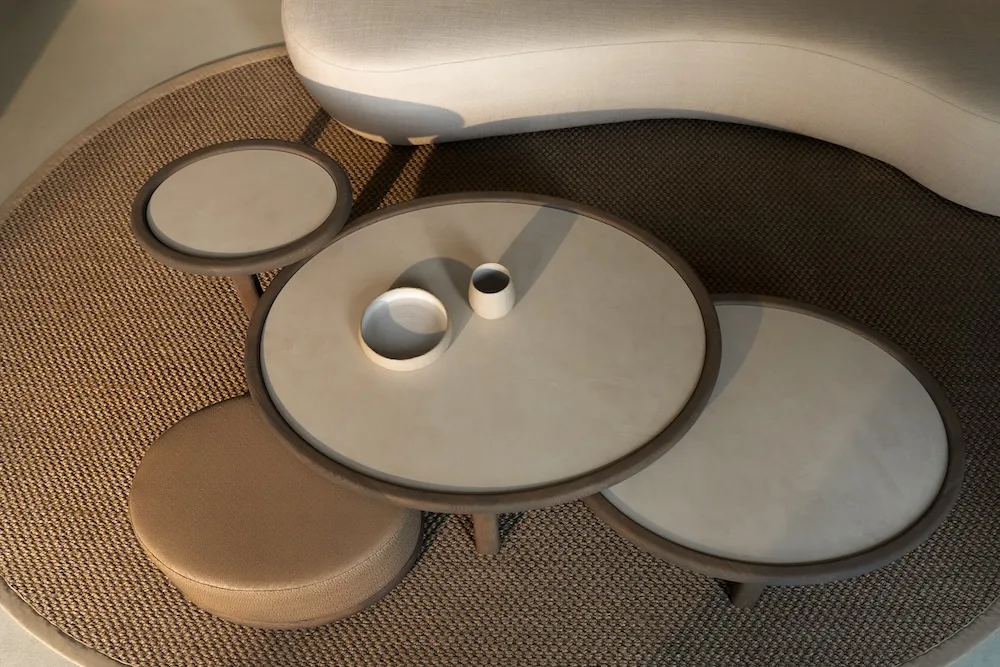 Overhead view of the Amalfi Coffee Table Set with minimalist ceramic objects and soft-toned seating.